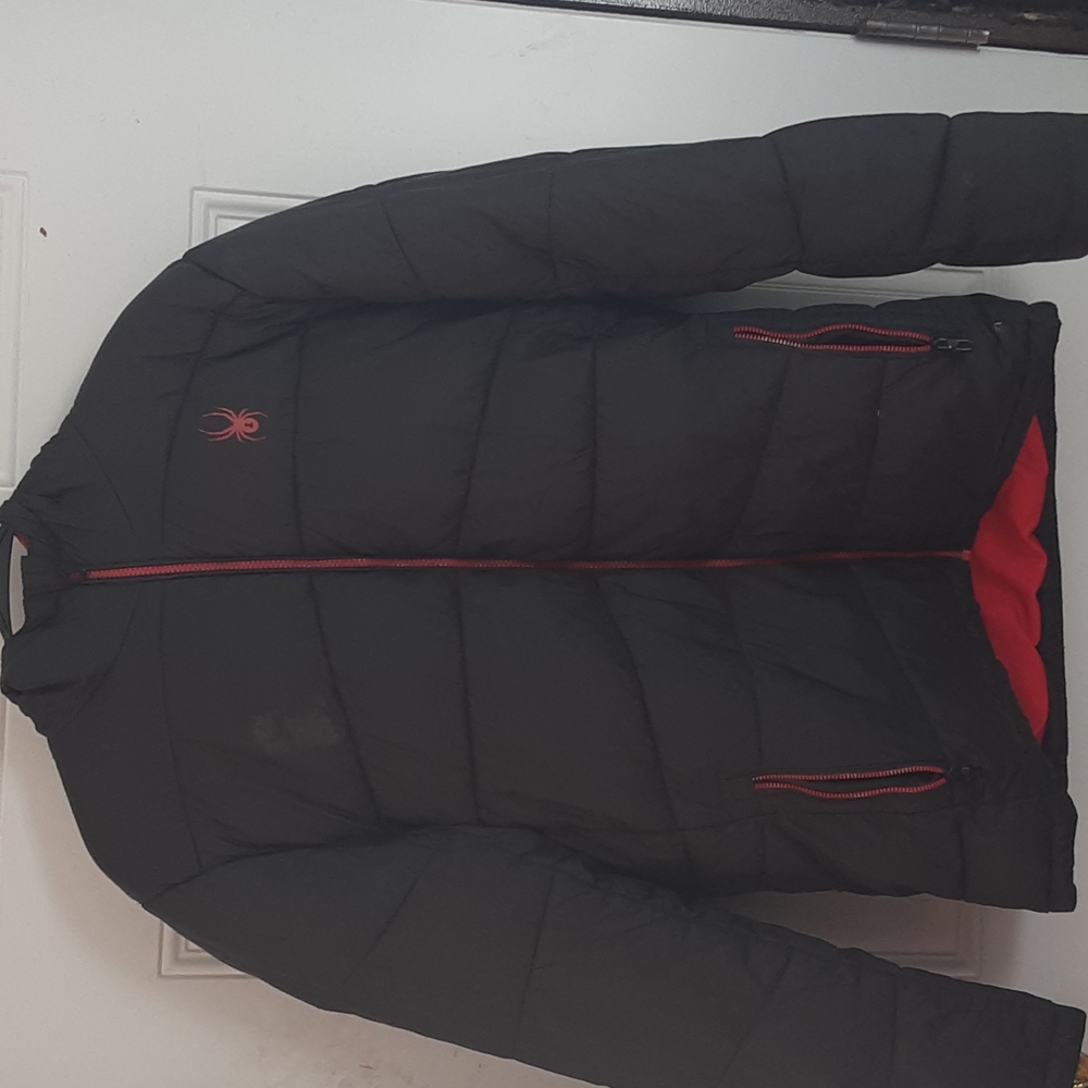 A girls black spider coat